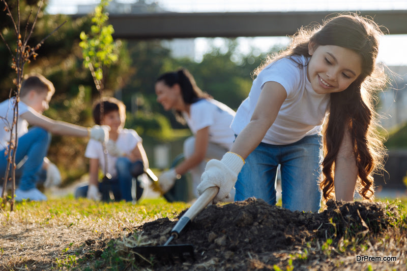 little girl Planting a Tree