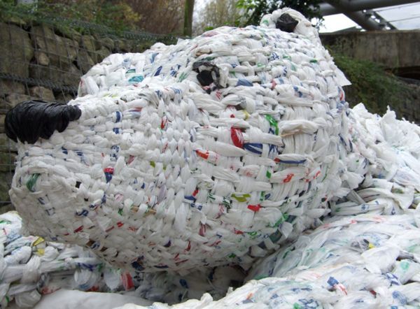 Polar bear sculpture consists of plastic bags,