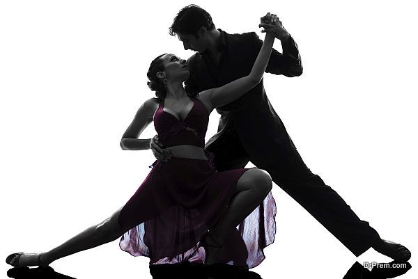 couple man woman ballroom dancers tangoing silhouette