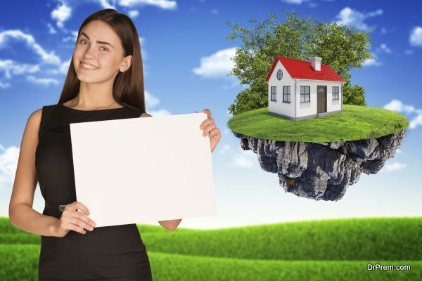 Smiling young businesswoman holding blank paper