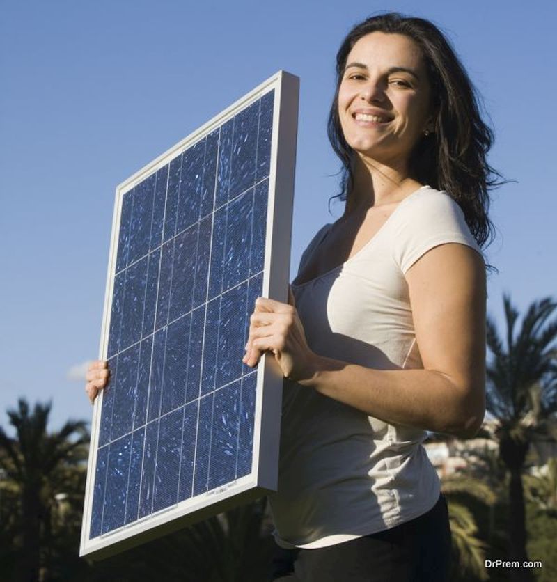 woman with a solar panel
