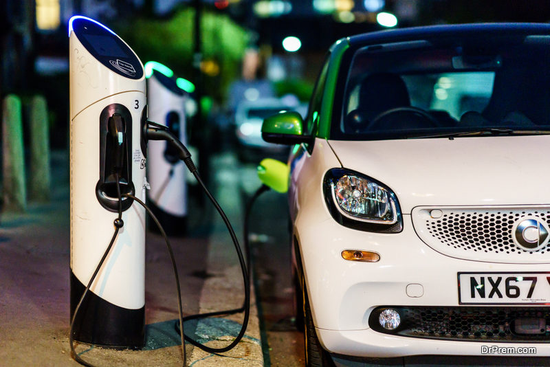 Smart electric car charging in the London Street st night.