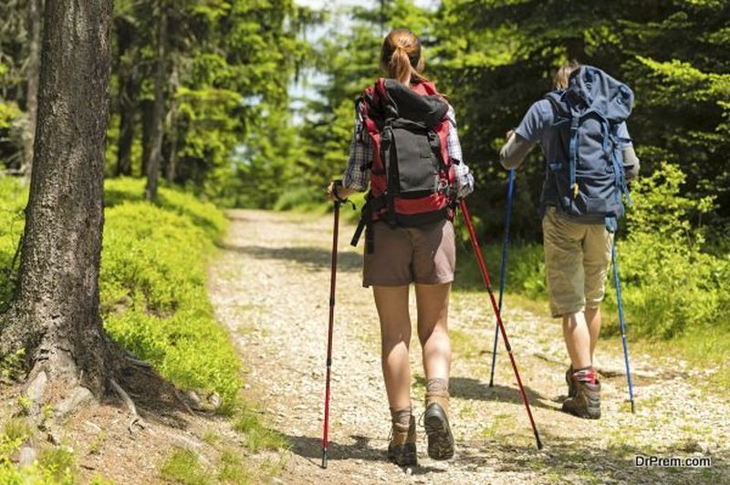 woman accompanied with ecotourism guide