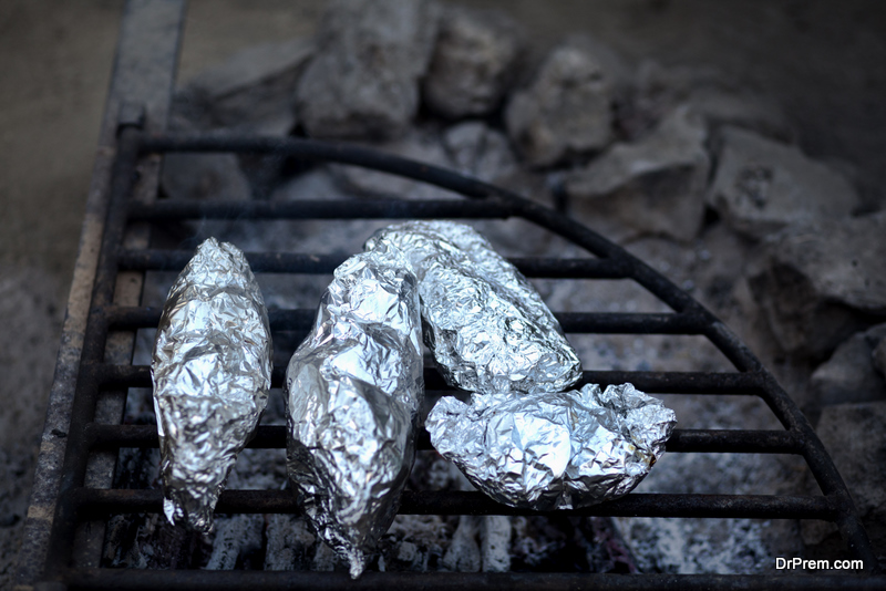 Cooking food in foil on a camping trip